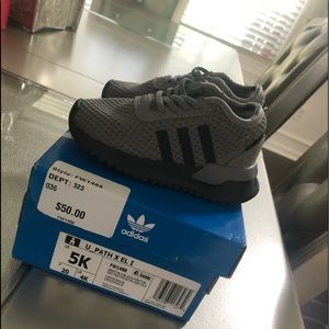 Gently used Adidas U path kids shoe